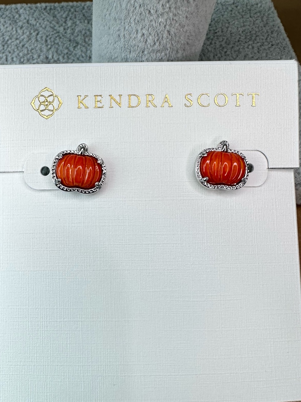 Kendra Scott Orange Carved Pumpkin Stud Earrings in Silvertone